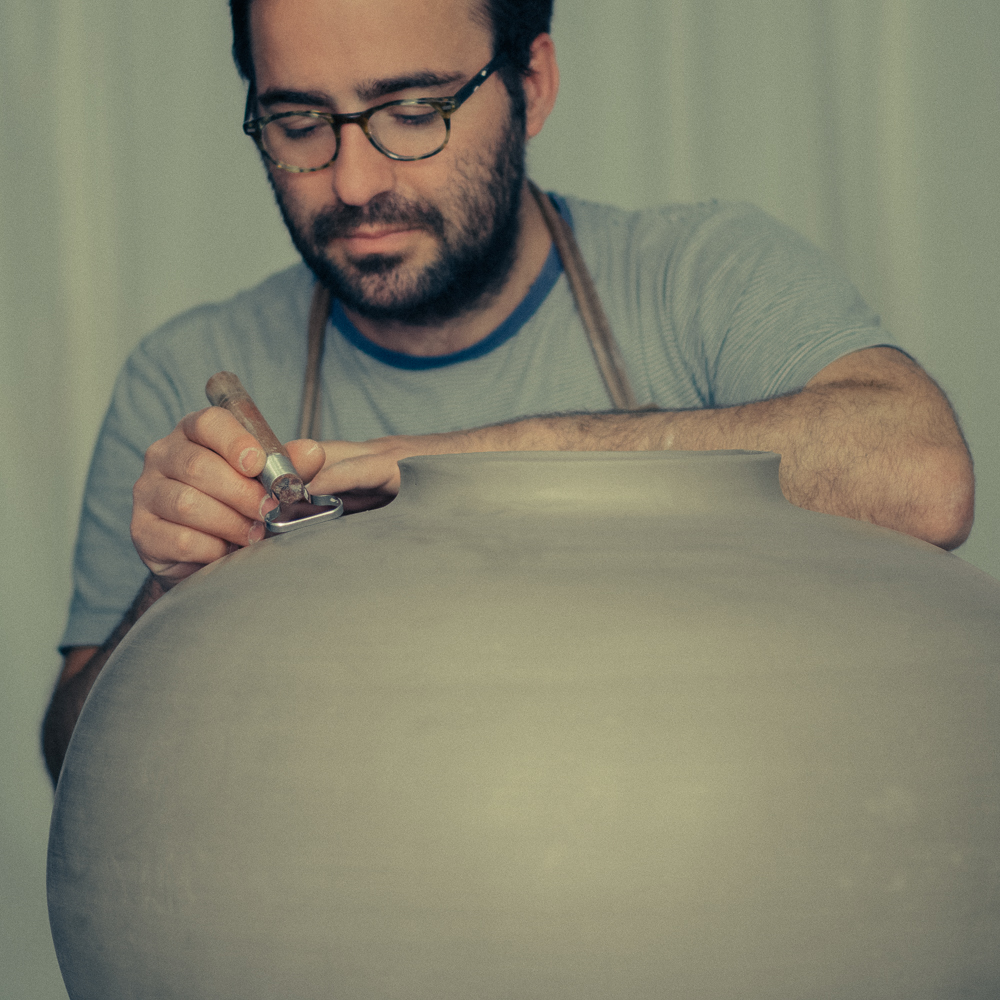 José Carvalho shaping a large vessel in the studio